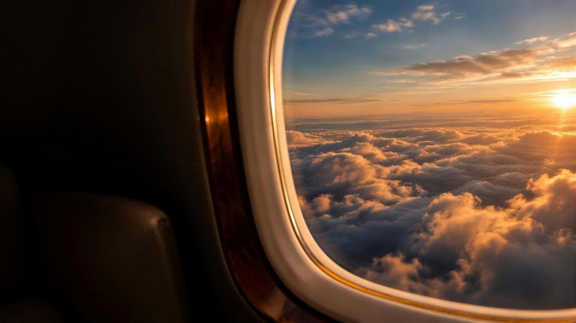 View from a private jet window at sunset